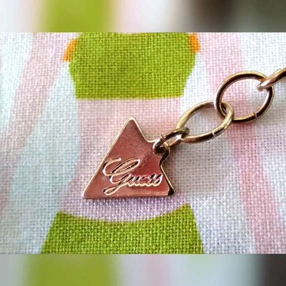 Guess Gold-Tone Romantic Charm Bracelet - Picture 9 of 10